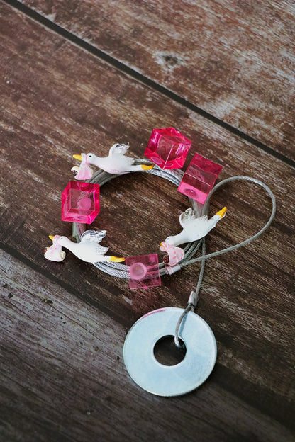 Fotoseilset mit Magneten (vertikal) - Storch mit Baby